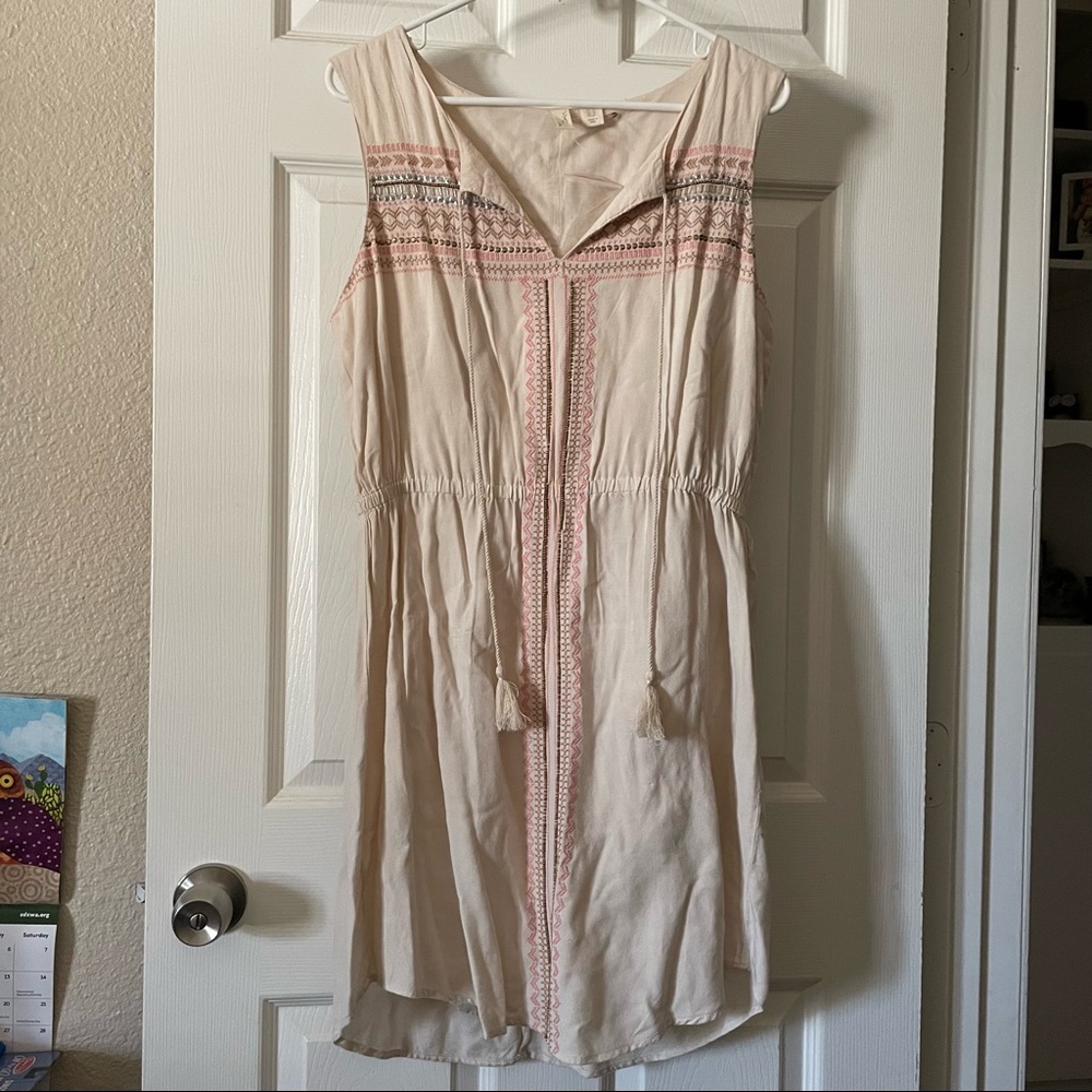 Beautiful Cream Dress with bead detailing